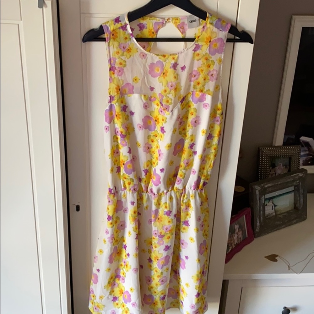 Floral knee length dress with cut out back